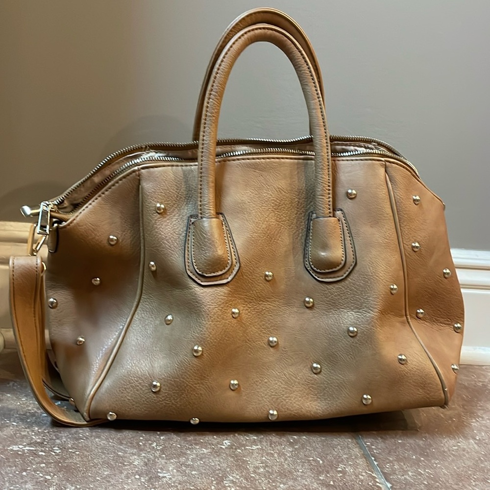 Saddle brown purse with gold studs